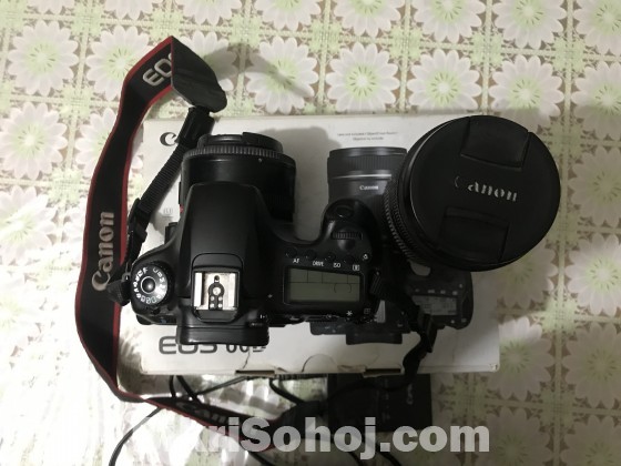 Canon 60d with 50mm prime & 18-135lense in original box